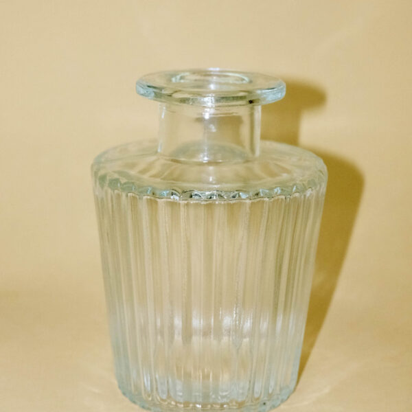 Skleněná vázička čirá se struktůrou 10 cm